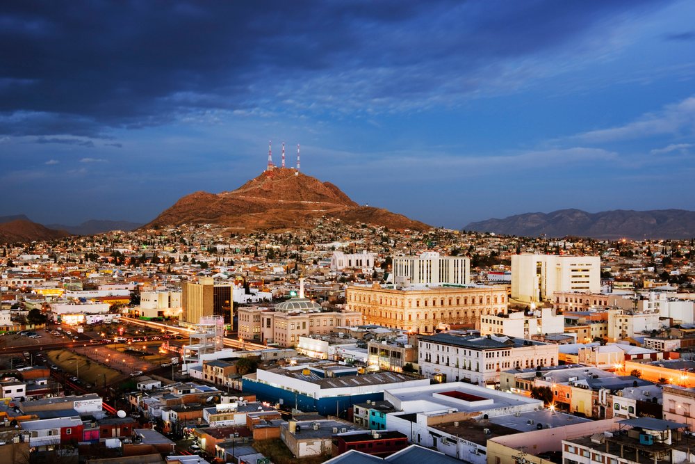Cerro coronel and cityscape of chihuahua, mexico at dusk