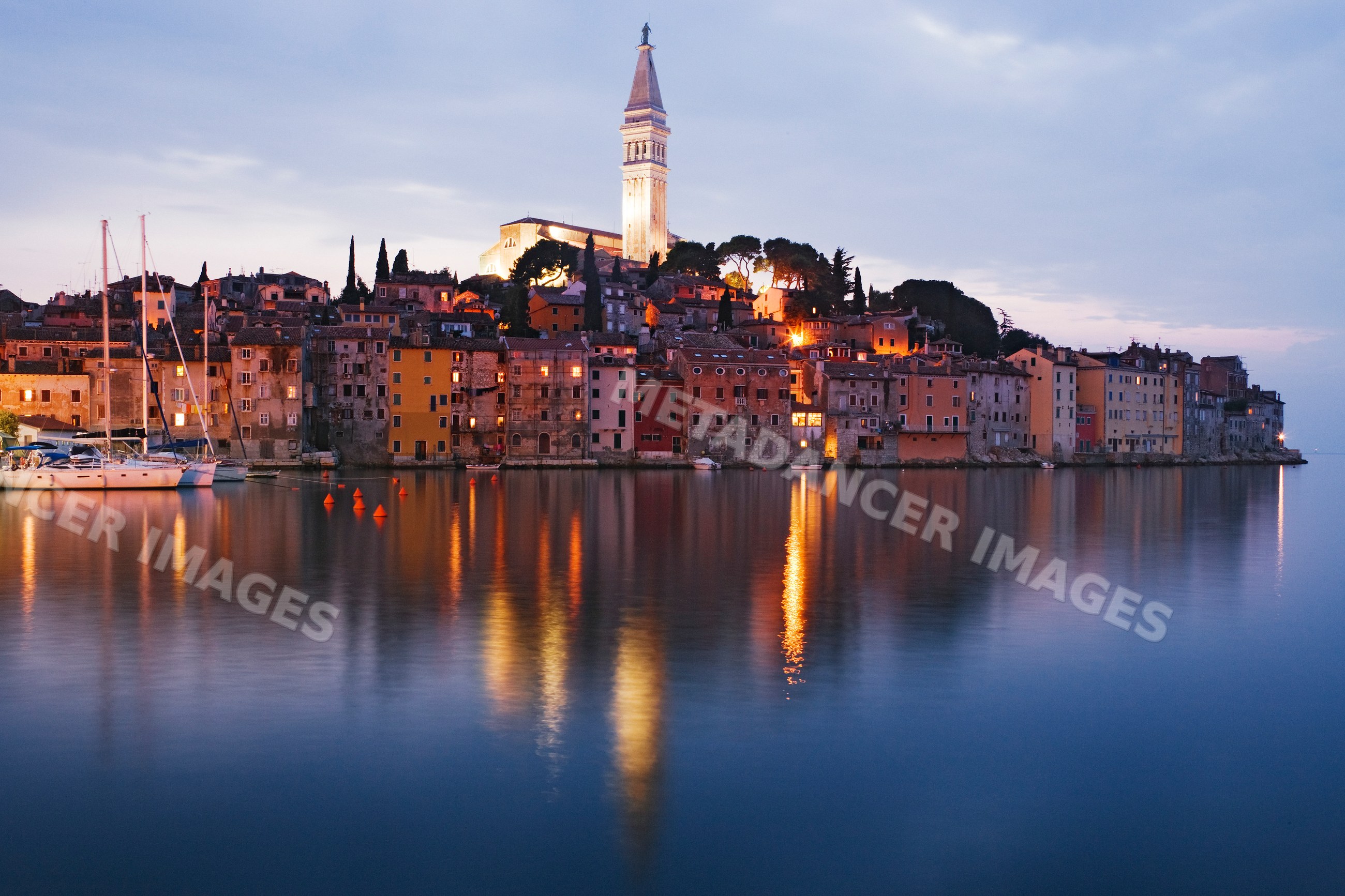 Town of rovinj waterfront and church tower in a church