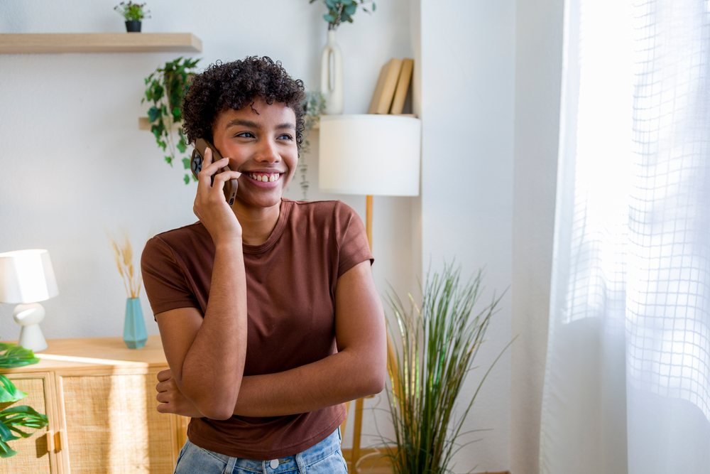Young African American woman talking on phone