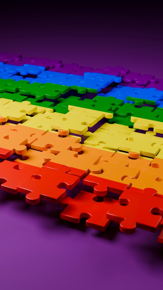 Multicolor jigsaw puzzle pieces on purple background illustration