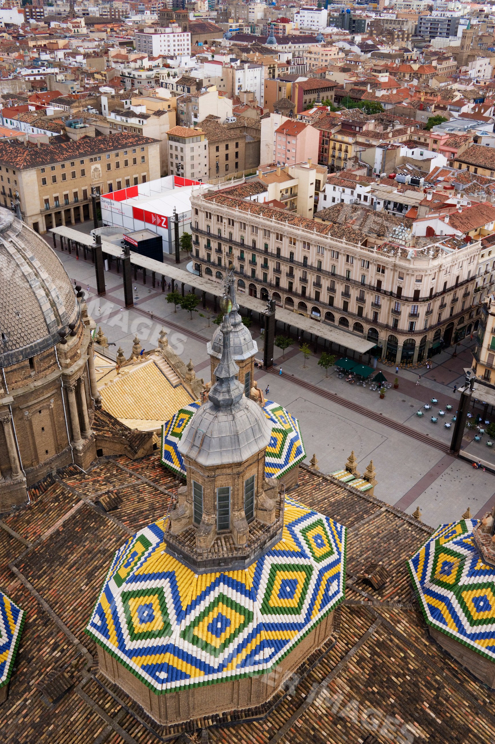 Plaza and basilica with colorful tiled domes, aragon, Spain