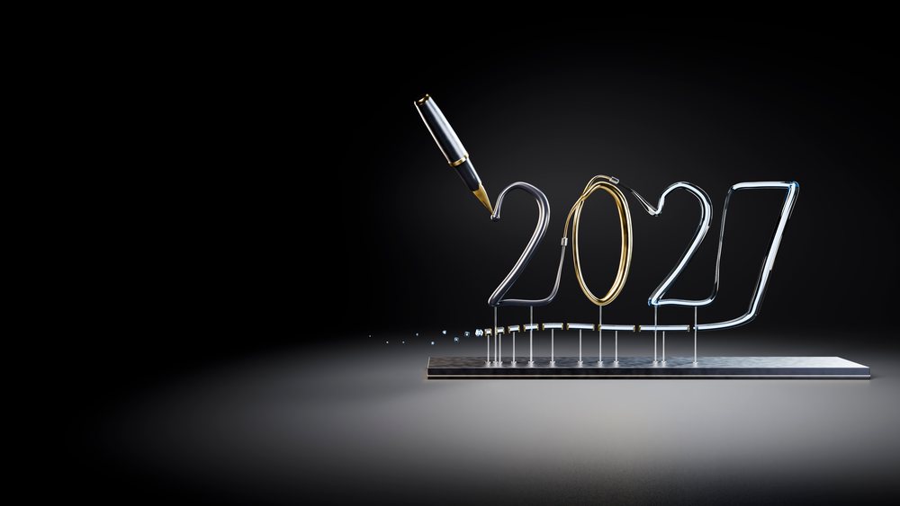 Metallic sculpture of 2027 being written by fountain pen