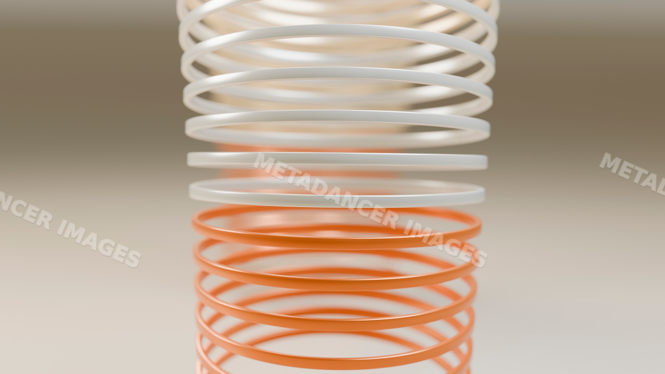Vertical stack of white and orange coil springs