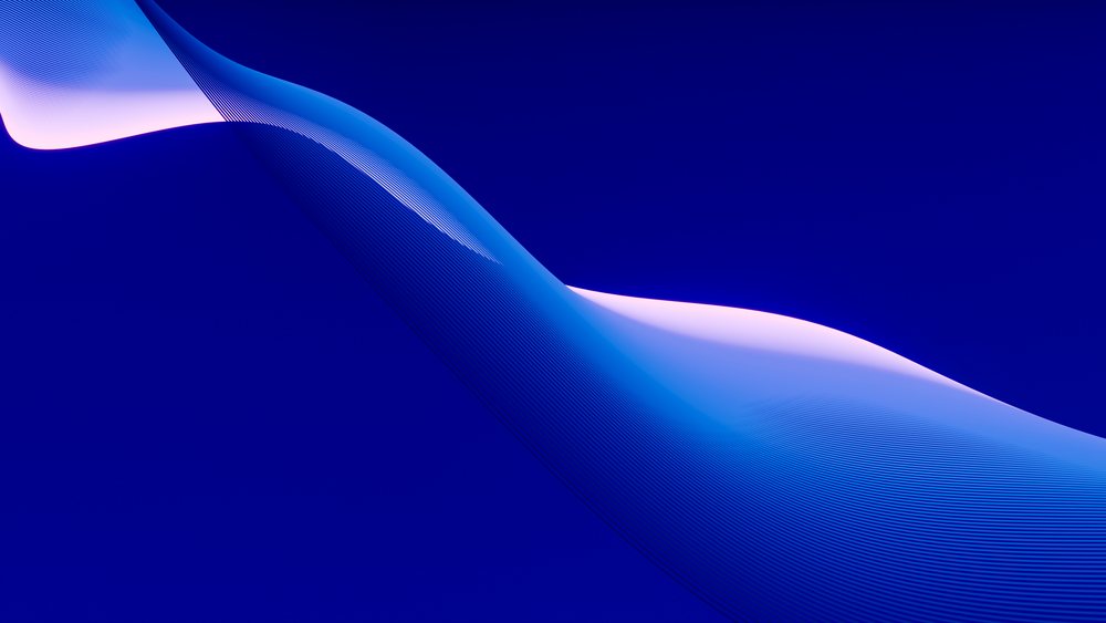 Abstract flowing blue wave shapes in digital art composition