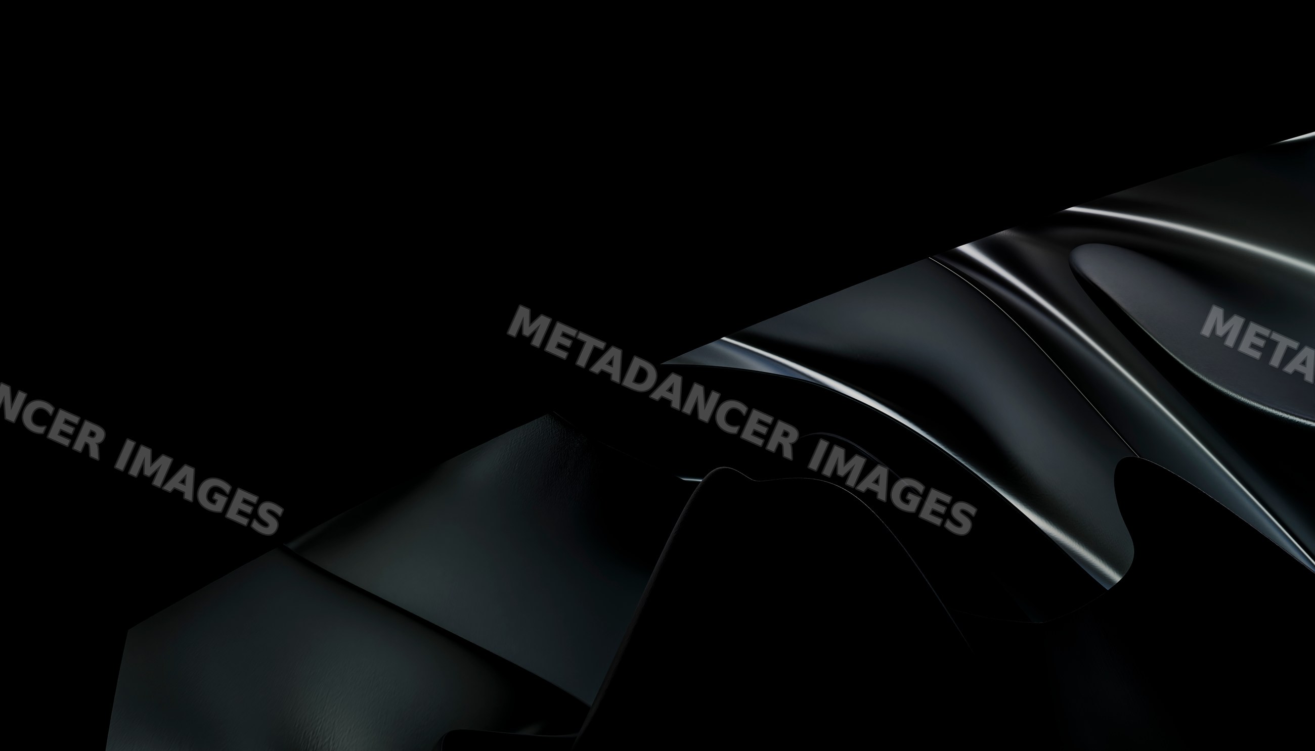 Close-up of smooth black leather with glossy folds and shadows