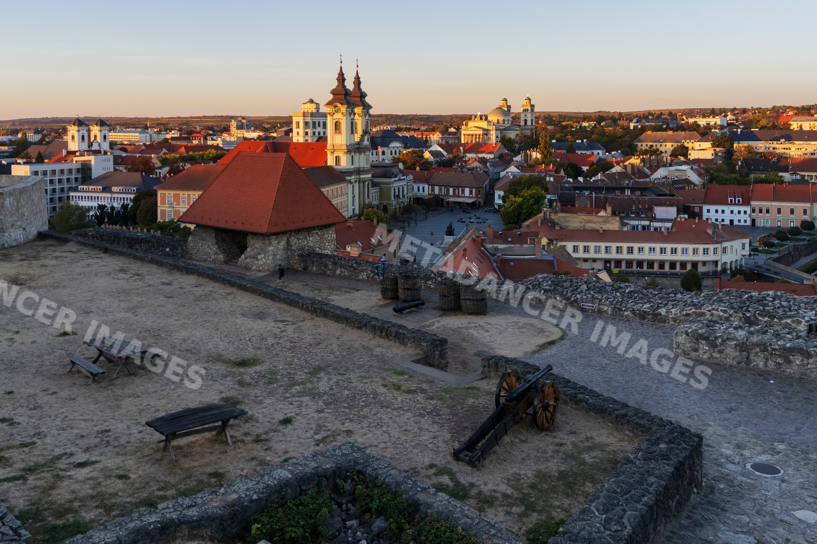 The Minorite Church at Dobó Square at Sunrise from the Castle