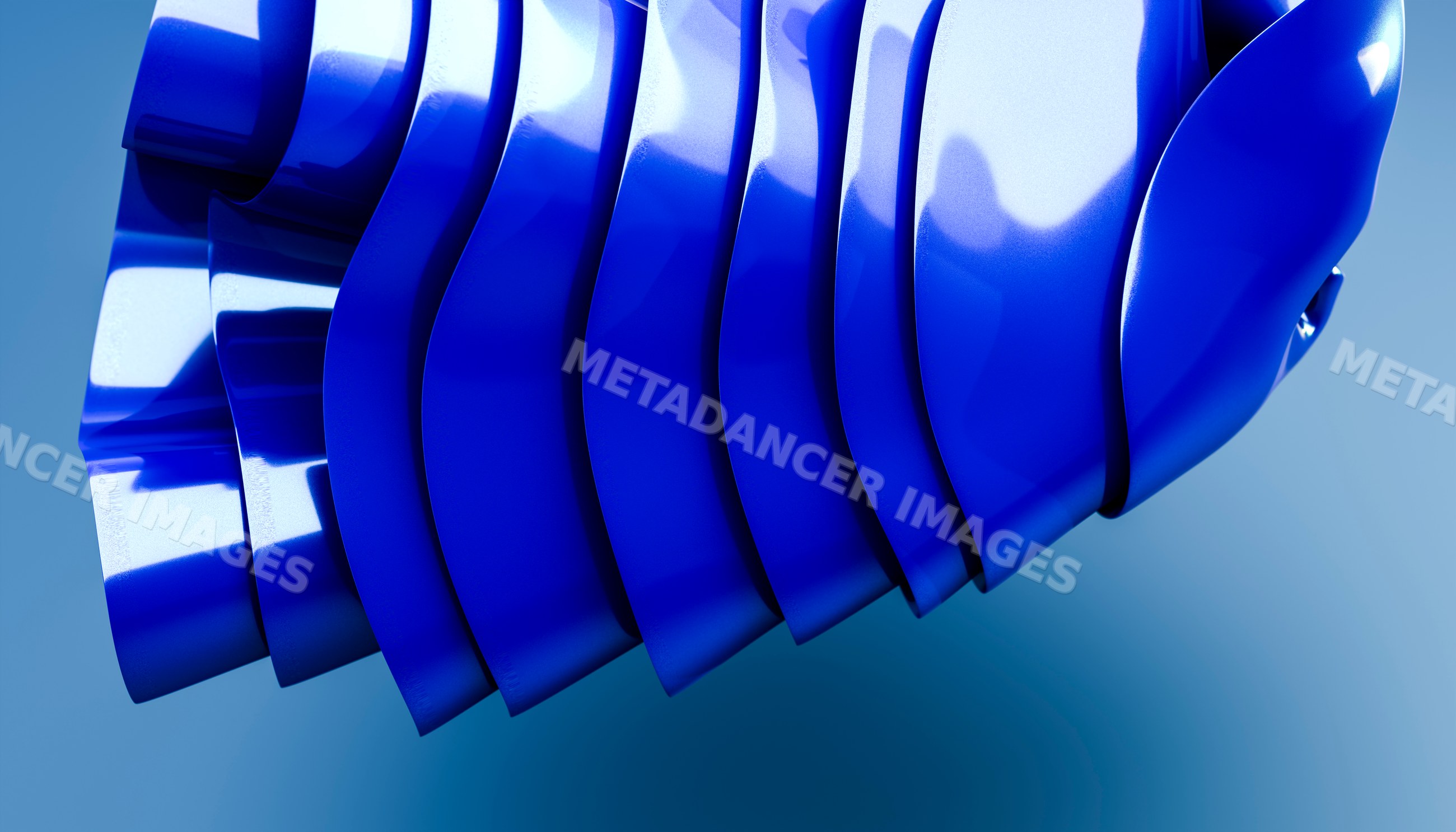 Blue abstract sculpture with layered curved glossy forms in studio