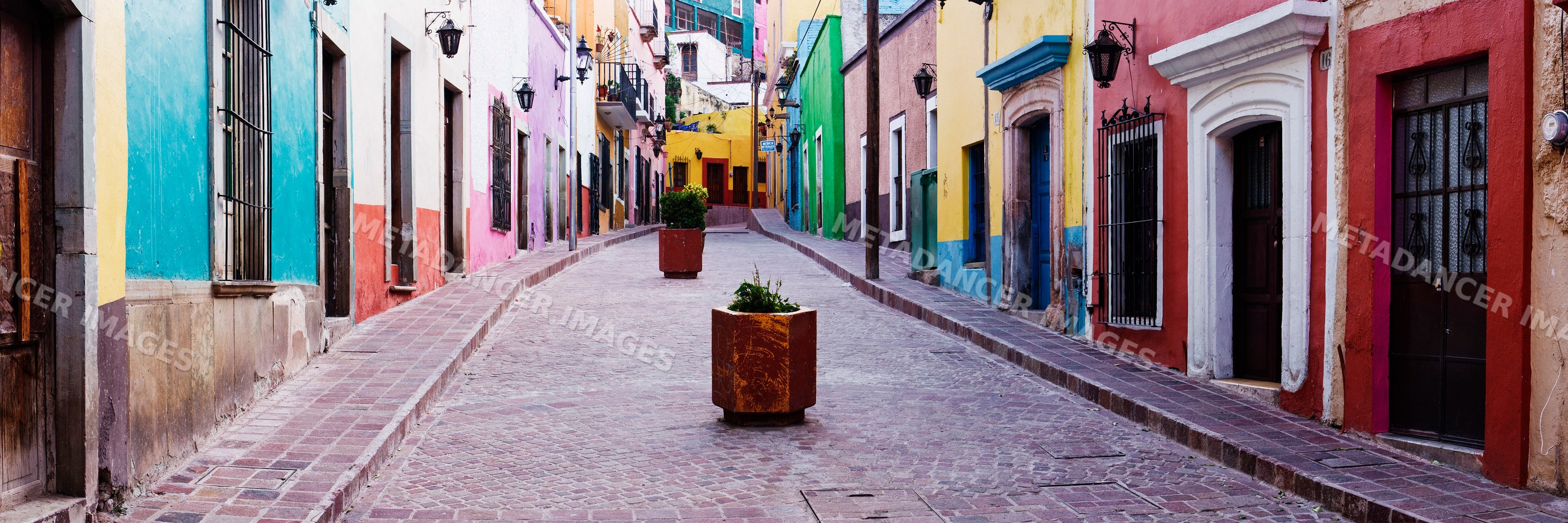 Colorful buildings along a narrow street, mexico
