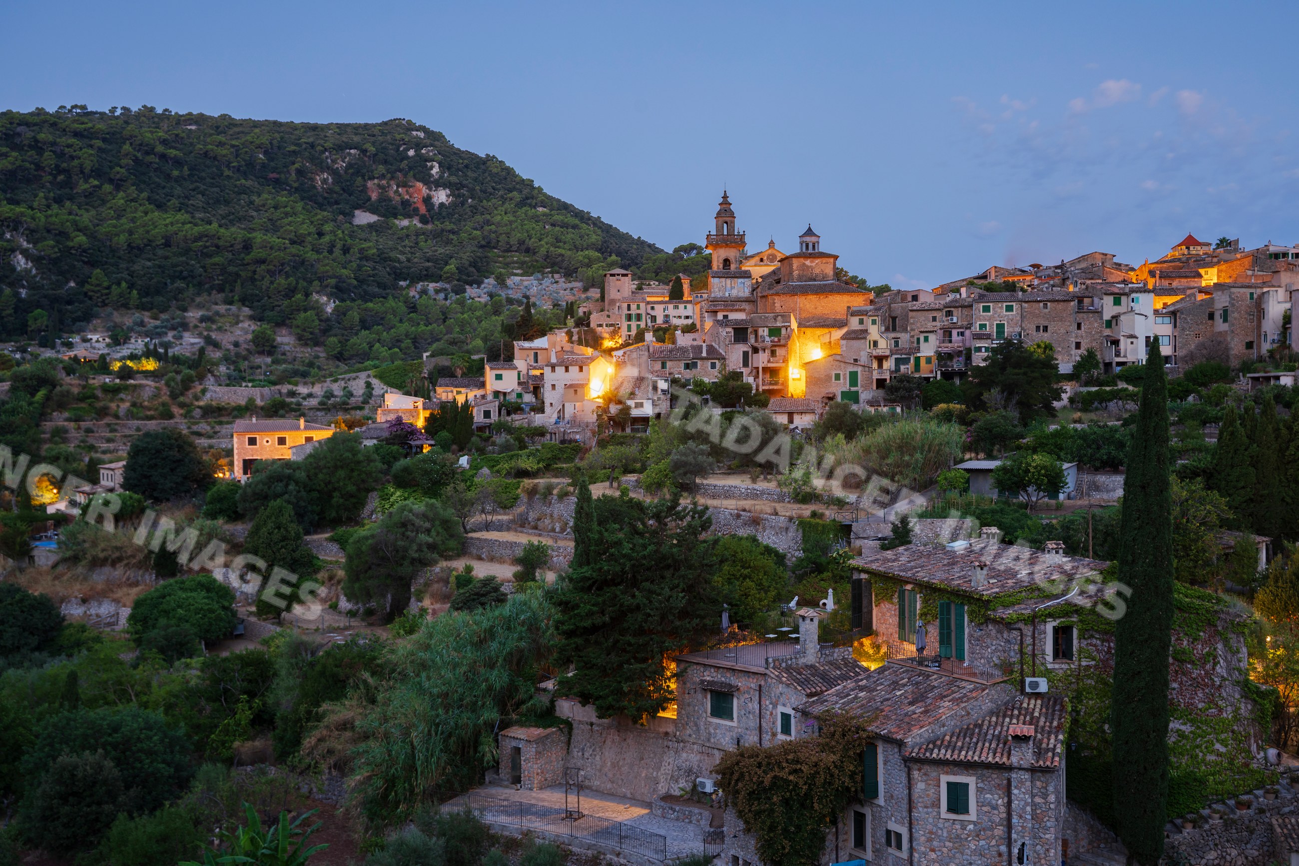 Valdemossa village at Sunrise with mountain and terraced landscape