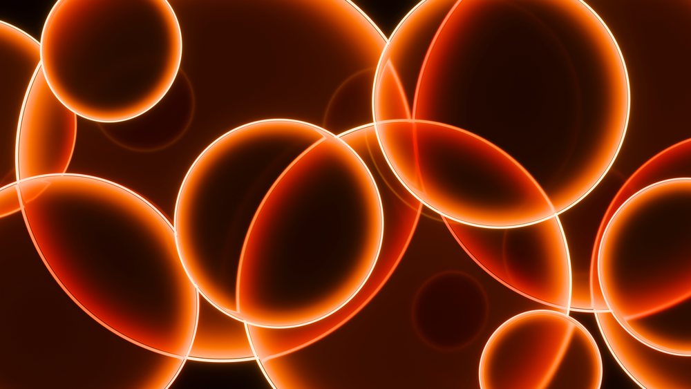 Abstract glowing orange overlapping circles digital illustration