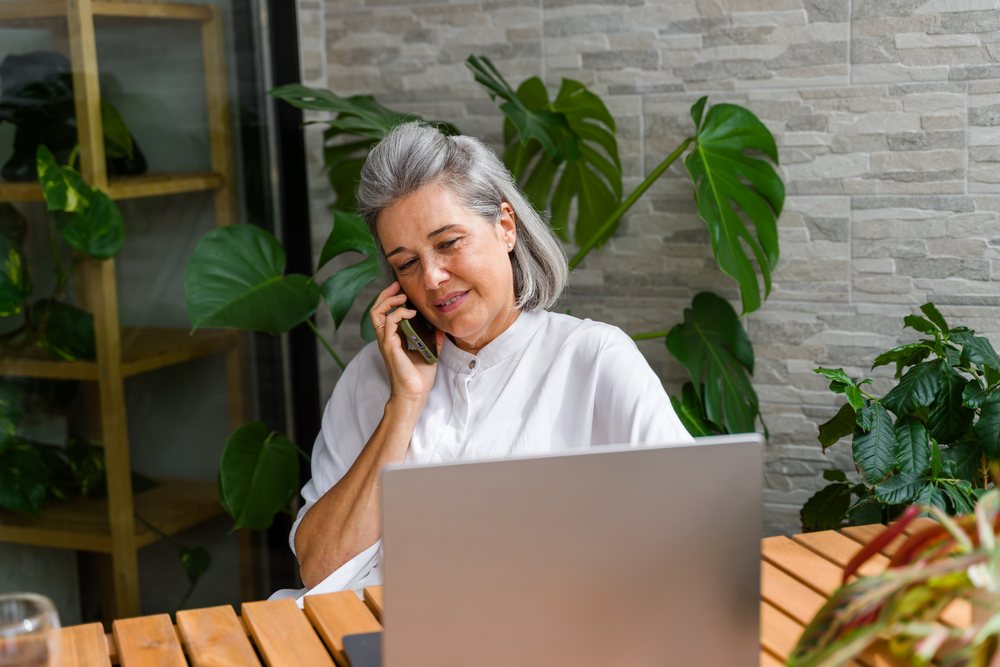 White Woman talking on phone