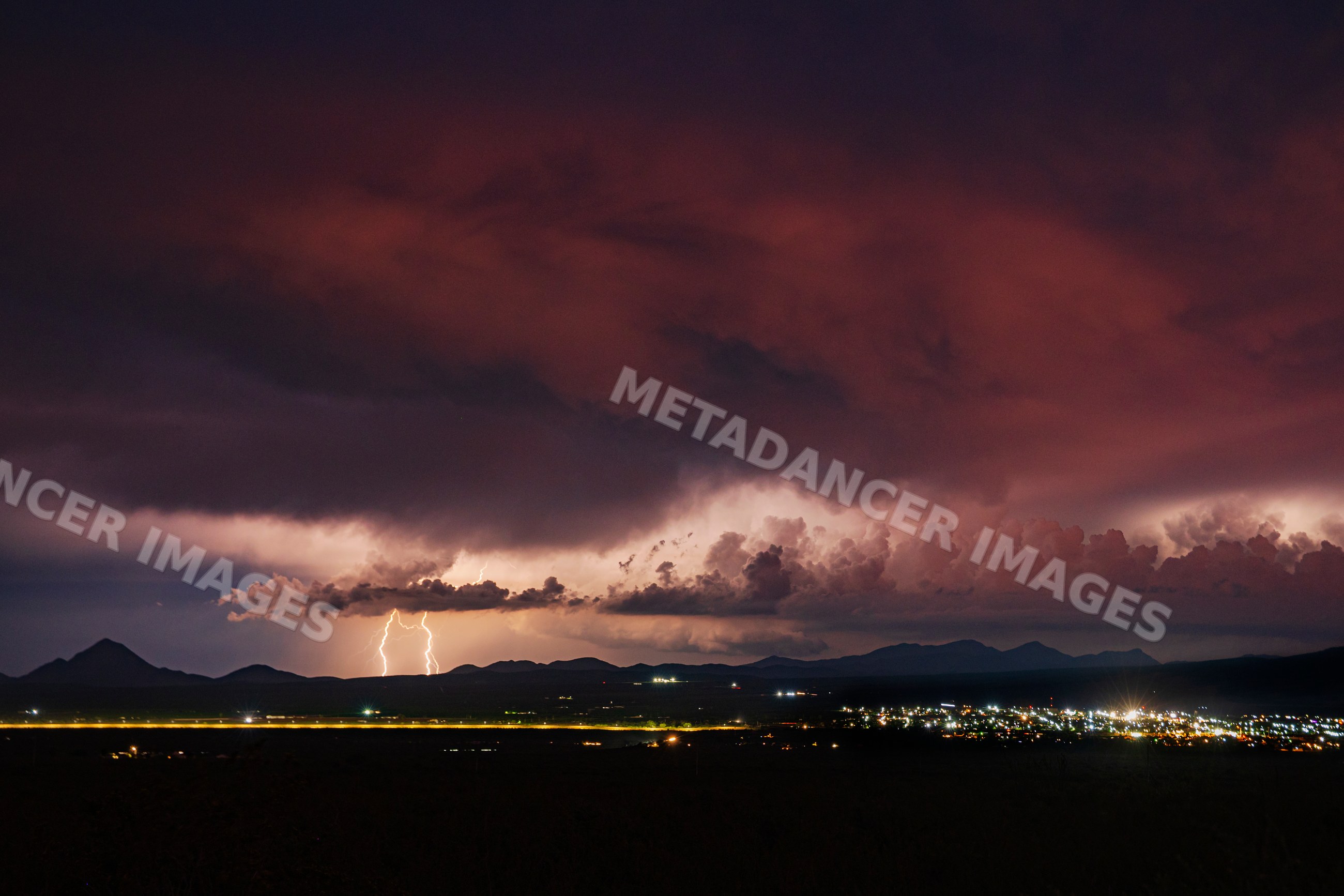 Lightning strikes over monsoon storm near bisbee, Arizona