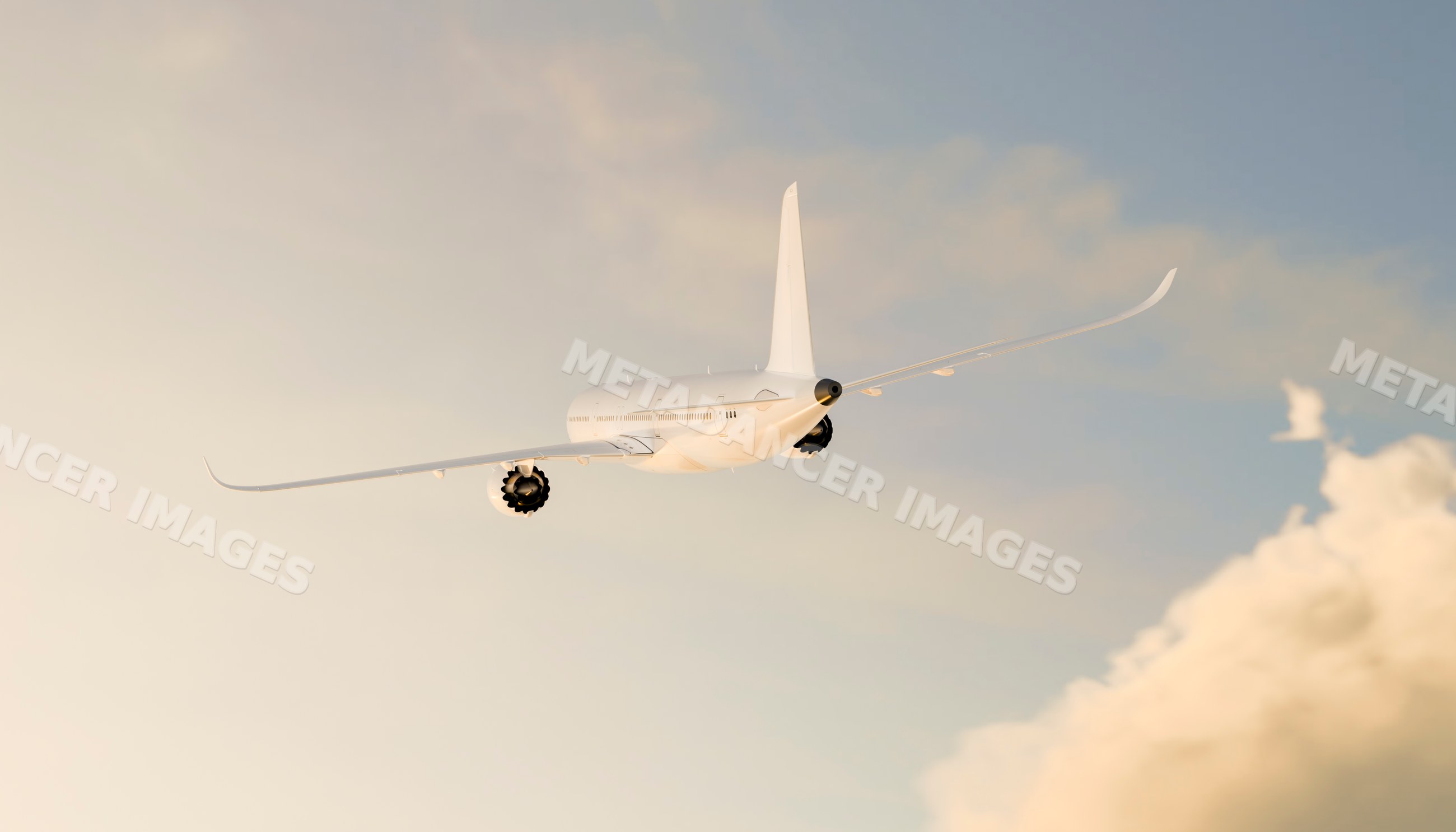 An airplane flies through a partly cloudy sky at sunset