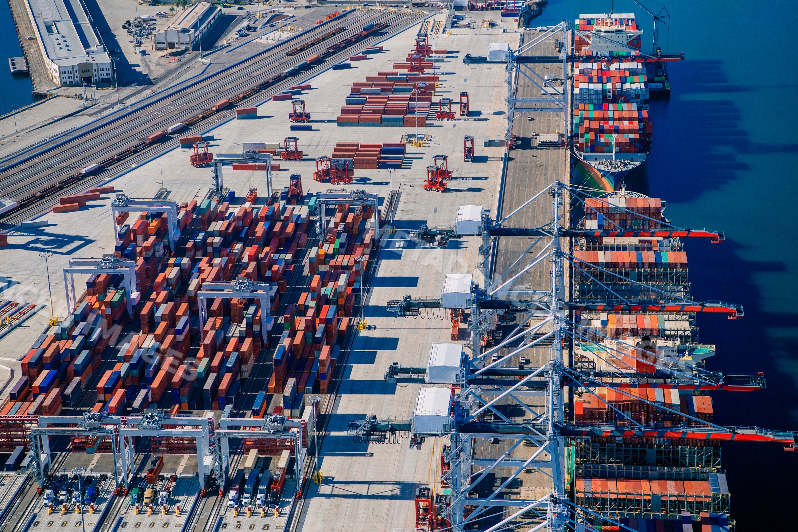 Container port with cranes and cargo ships at a major port in long