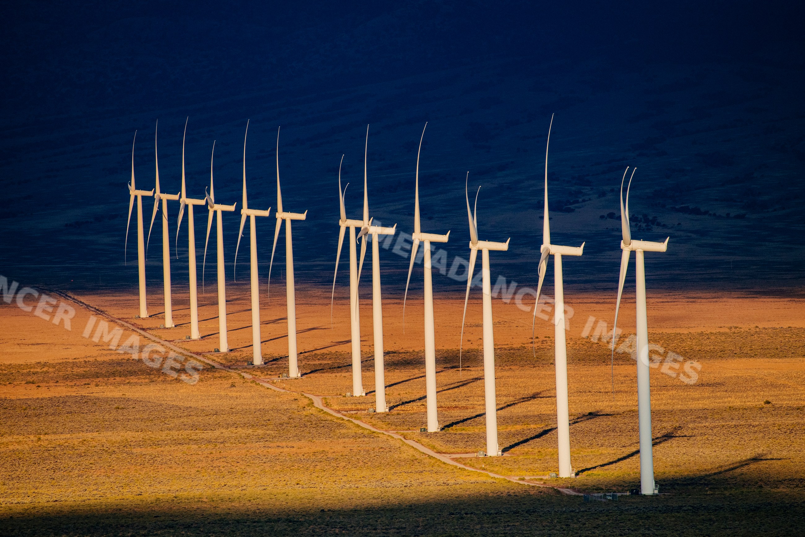 Wind turbines generating renewable energy in Nevada desert