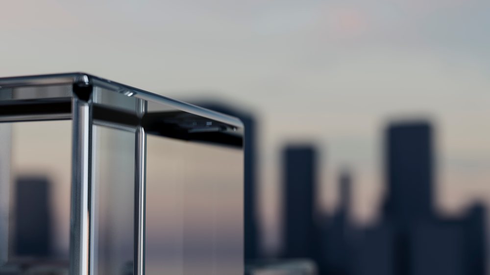Close-up of metal frame structure with city skyline background