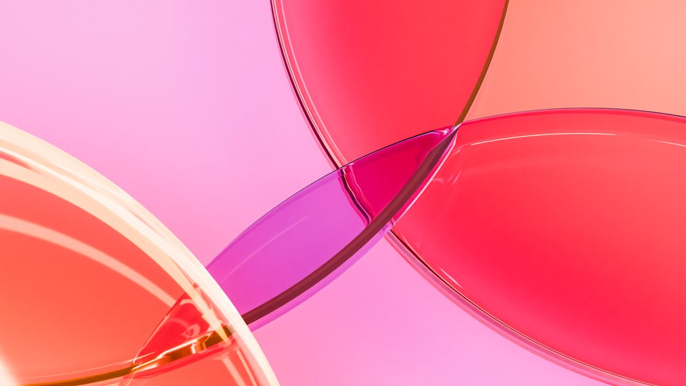 Colored transparent glass shapes overlapping in abstract illustration
