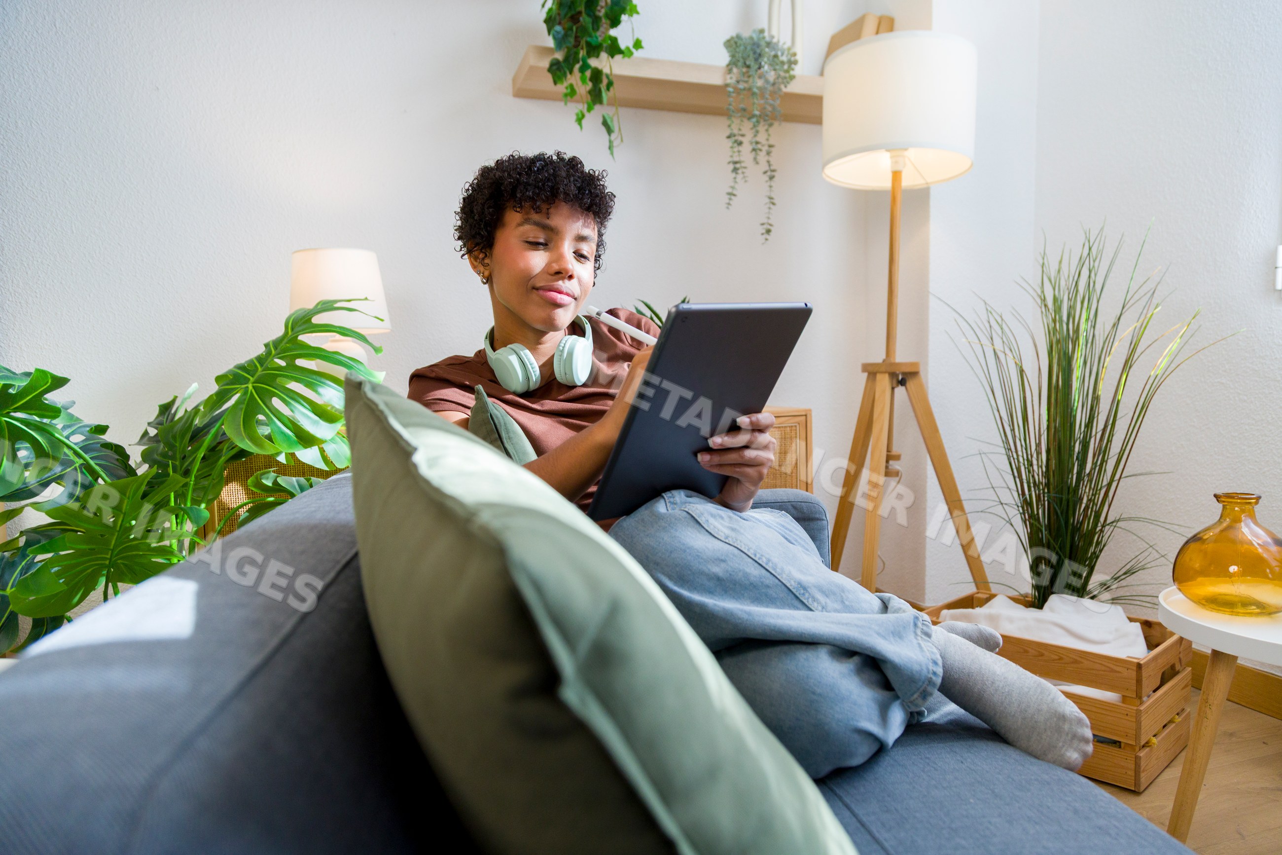 Young African American woman using tablet