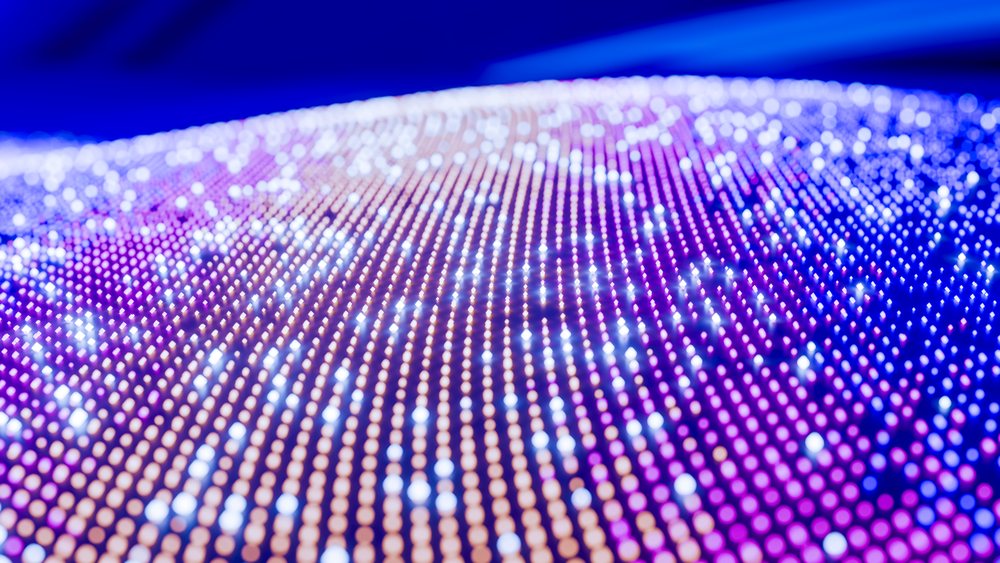 Glowing led lights forming colorful digital pattern