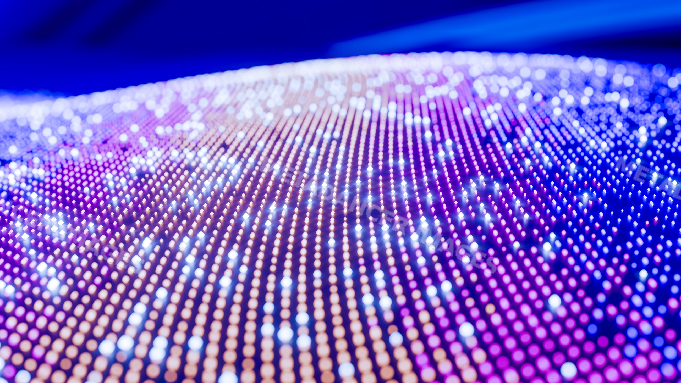 Glowing led lights forming colorful digital pattern