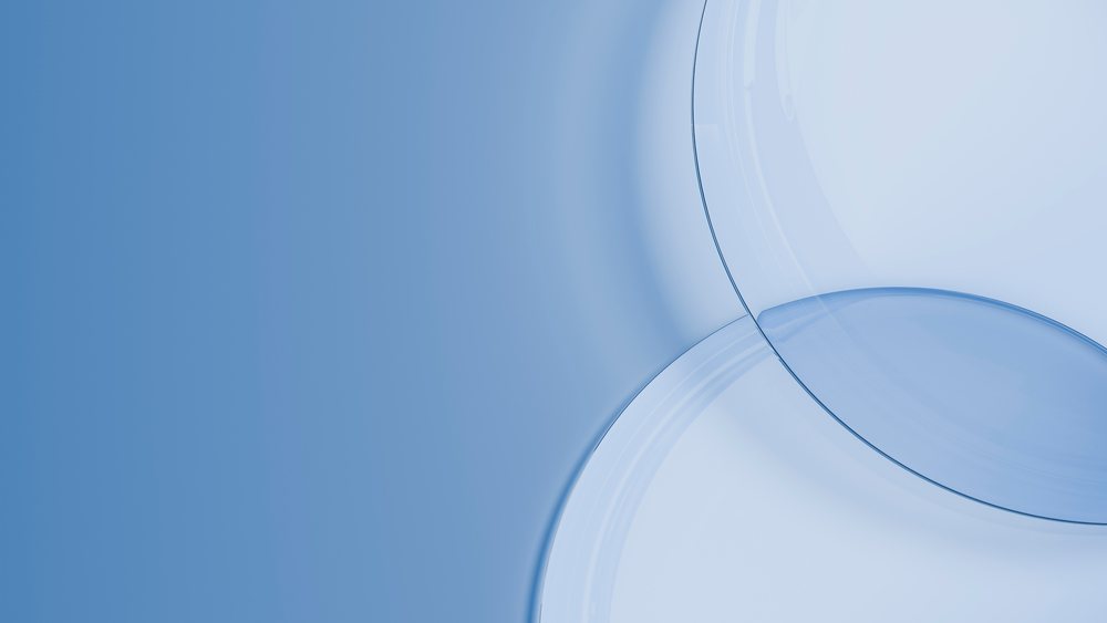 Overlapping transparent blue glass circles abstract illustration