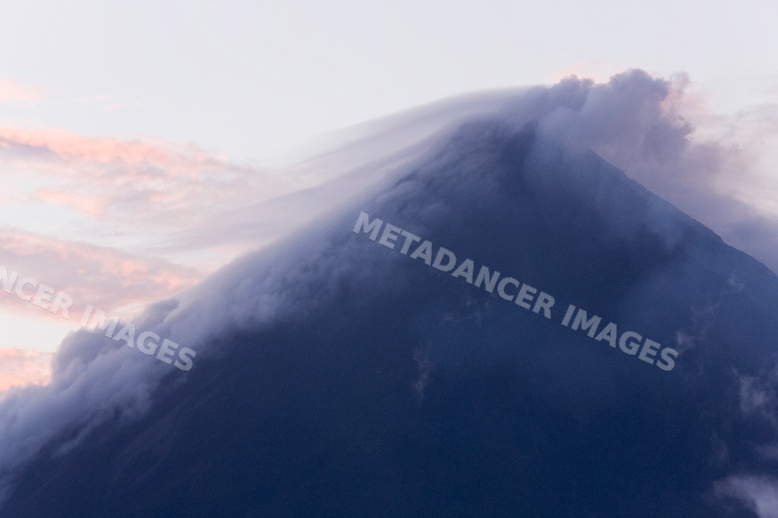 Arenal volcano with smoky clouds, costa rica