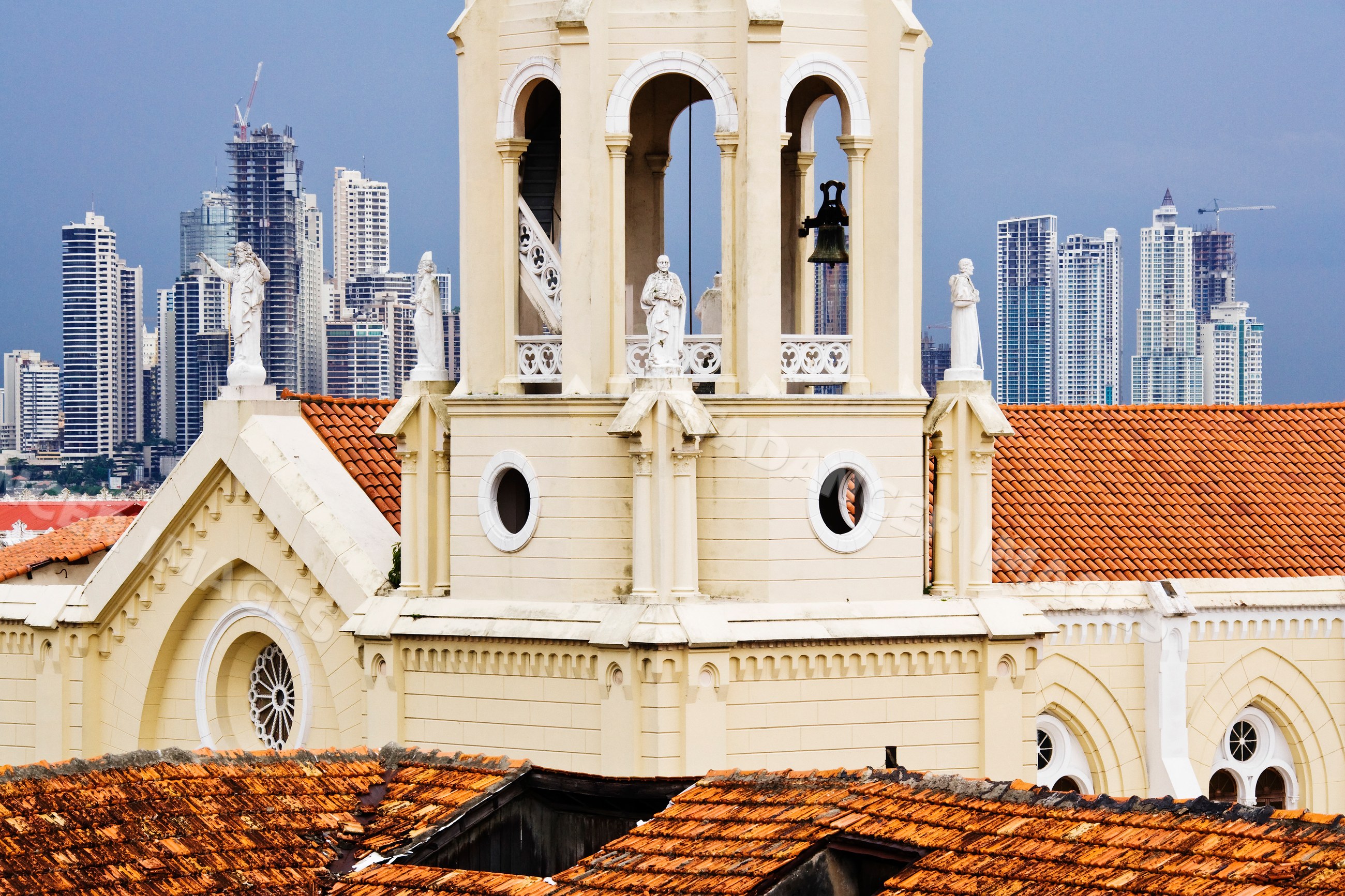 Bell tower of iglesia de san francisco with panama city skyline