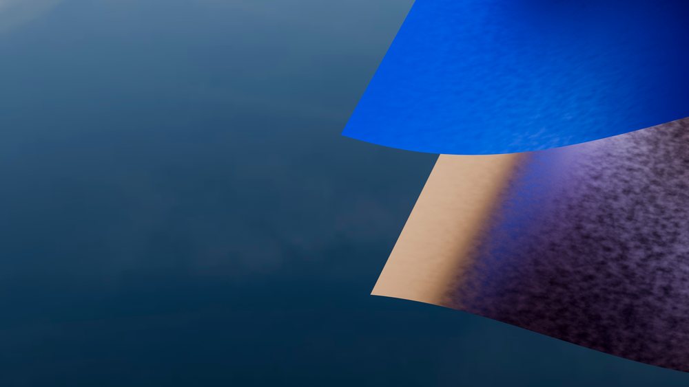 Blue, beige, and purple folded fabric pieces close-up