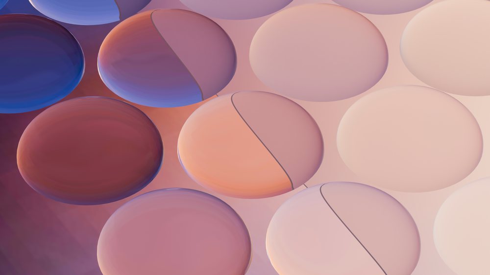 Close-up of overlapping medical capsules with soft lighting