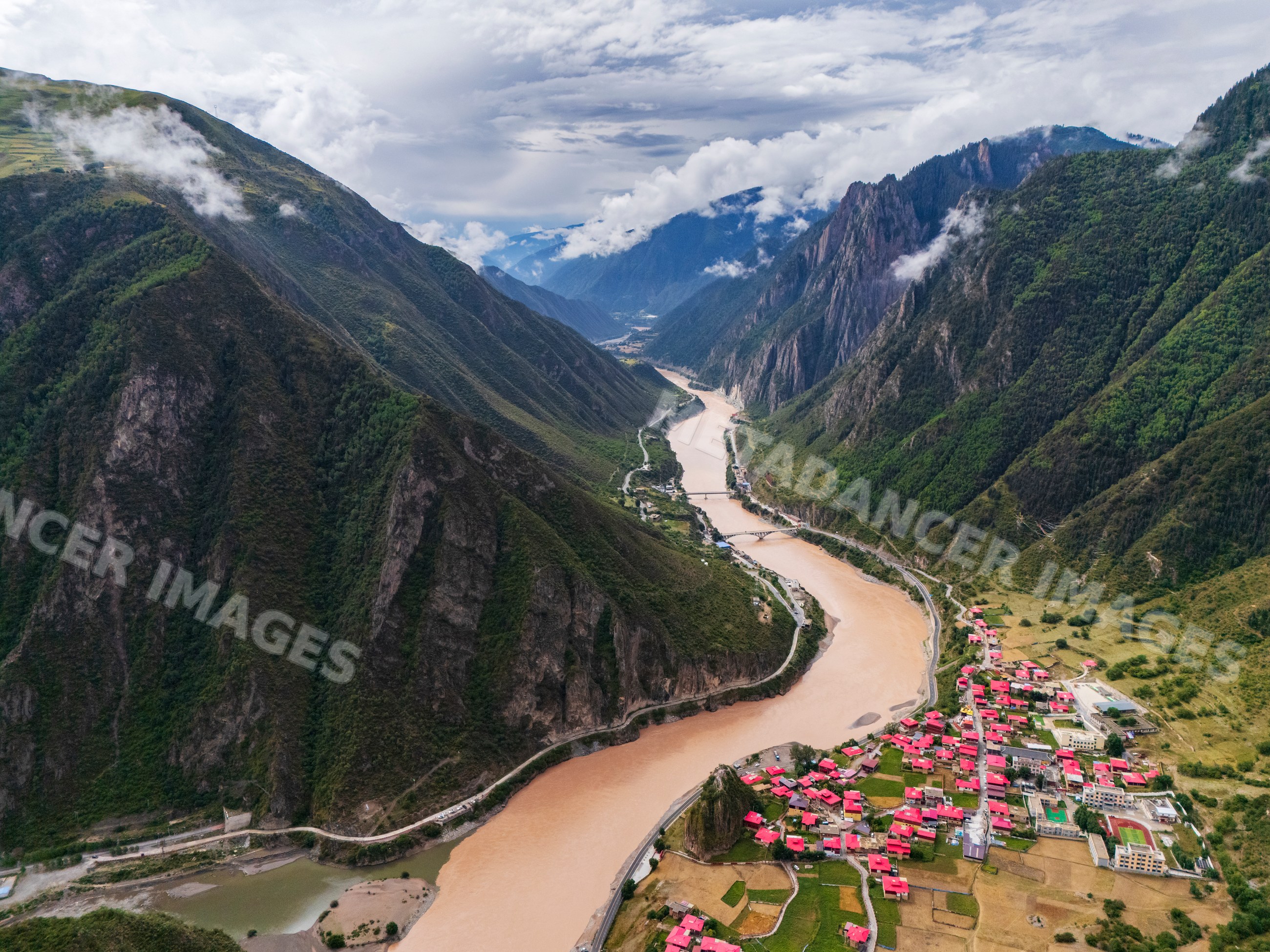 Jinsha river winding through mountains and gangtuocun village