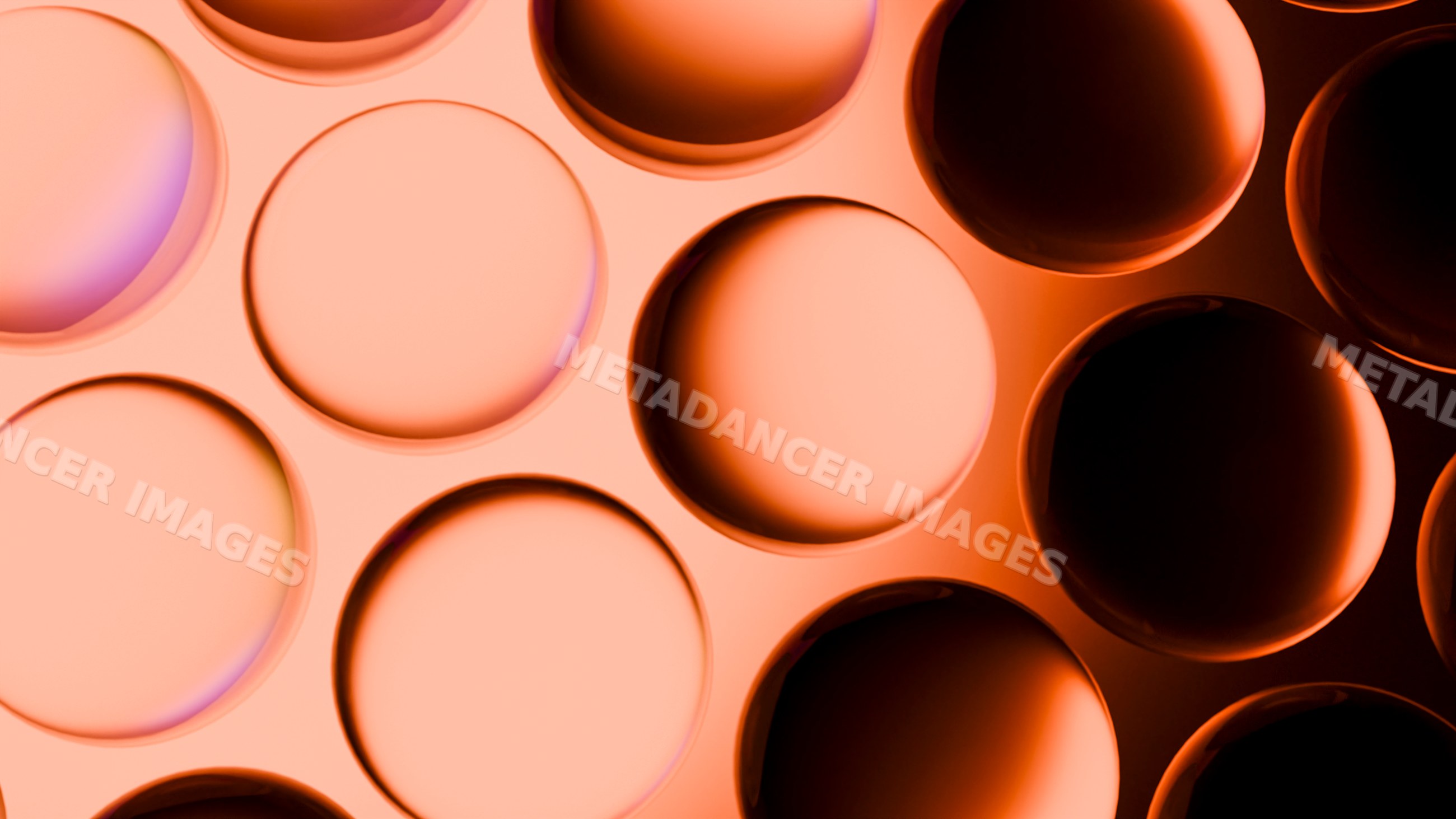 Close-up of glossy orange circular shapes