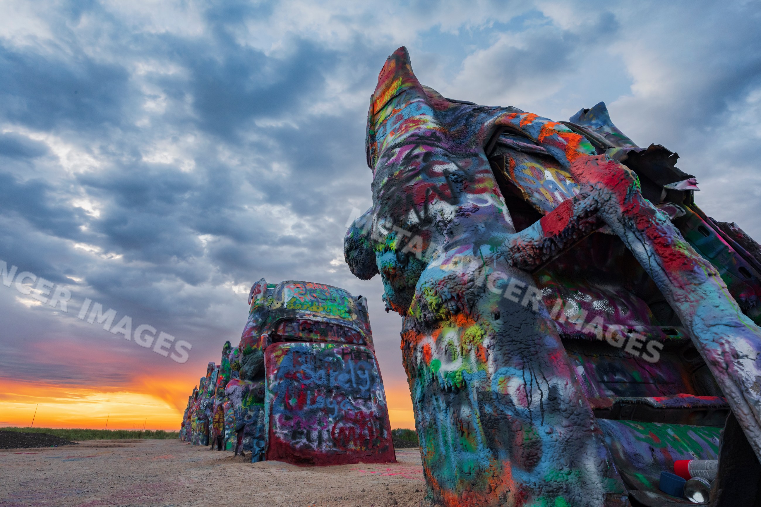 Cadillac ranch colorful car art installation