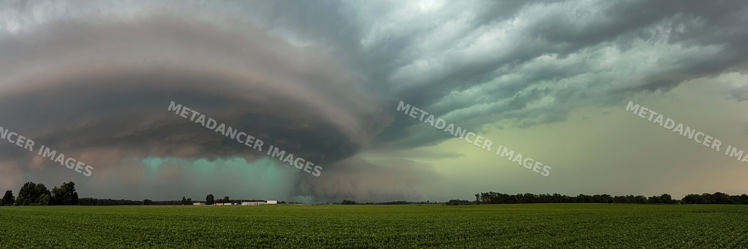 Supercell storm cloud over rural field near charleston, illinois