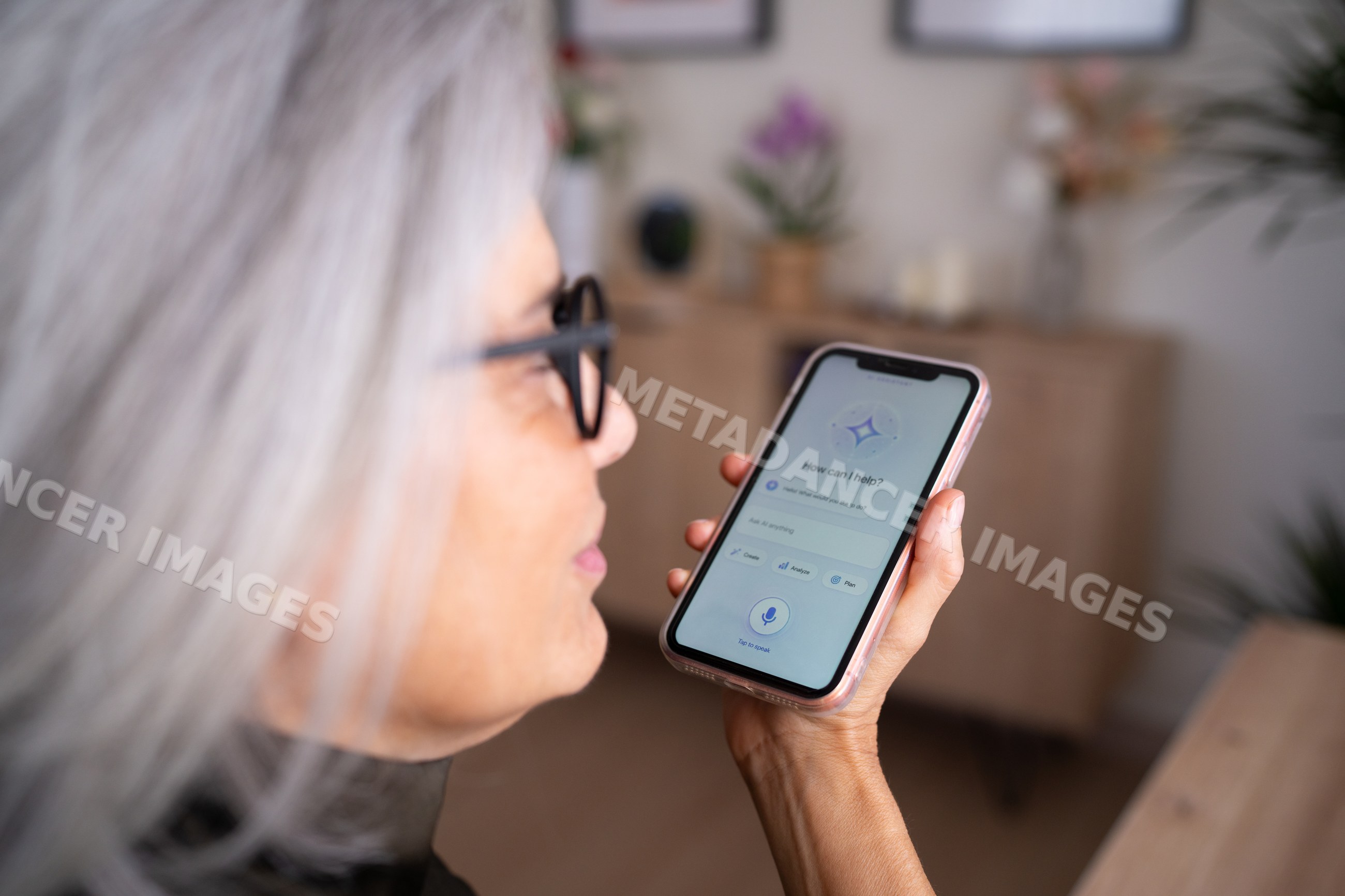 White woman using voice assistant on smartphone indoors