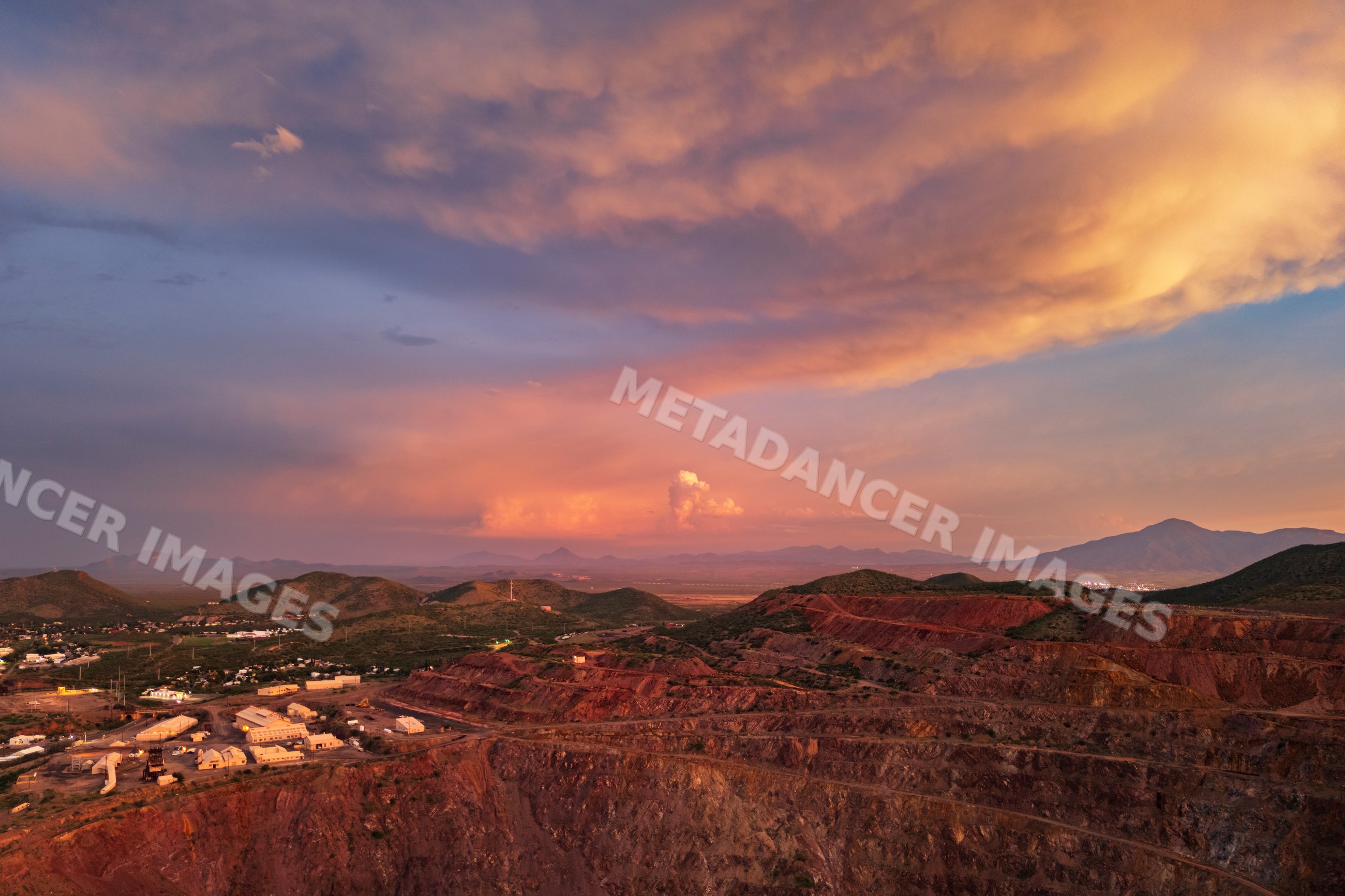 Bisbee Copper Mine open pit at Dusk with mining buildings