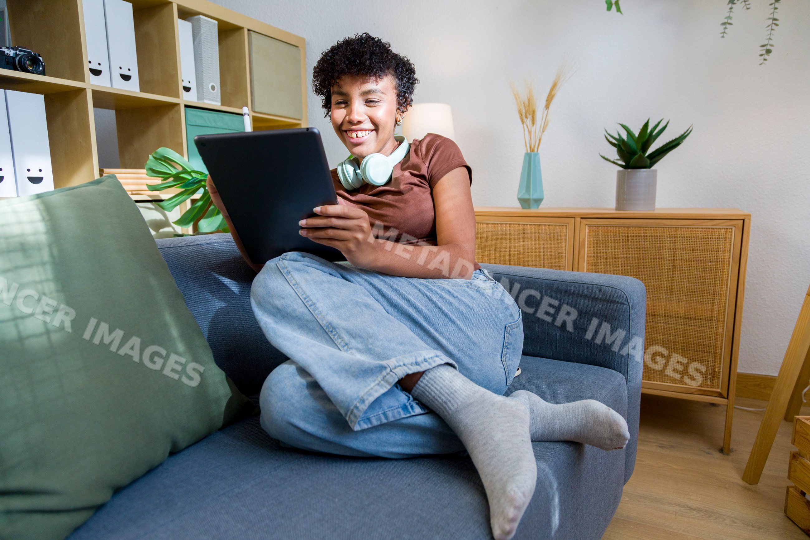 Young African American woman using tablet