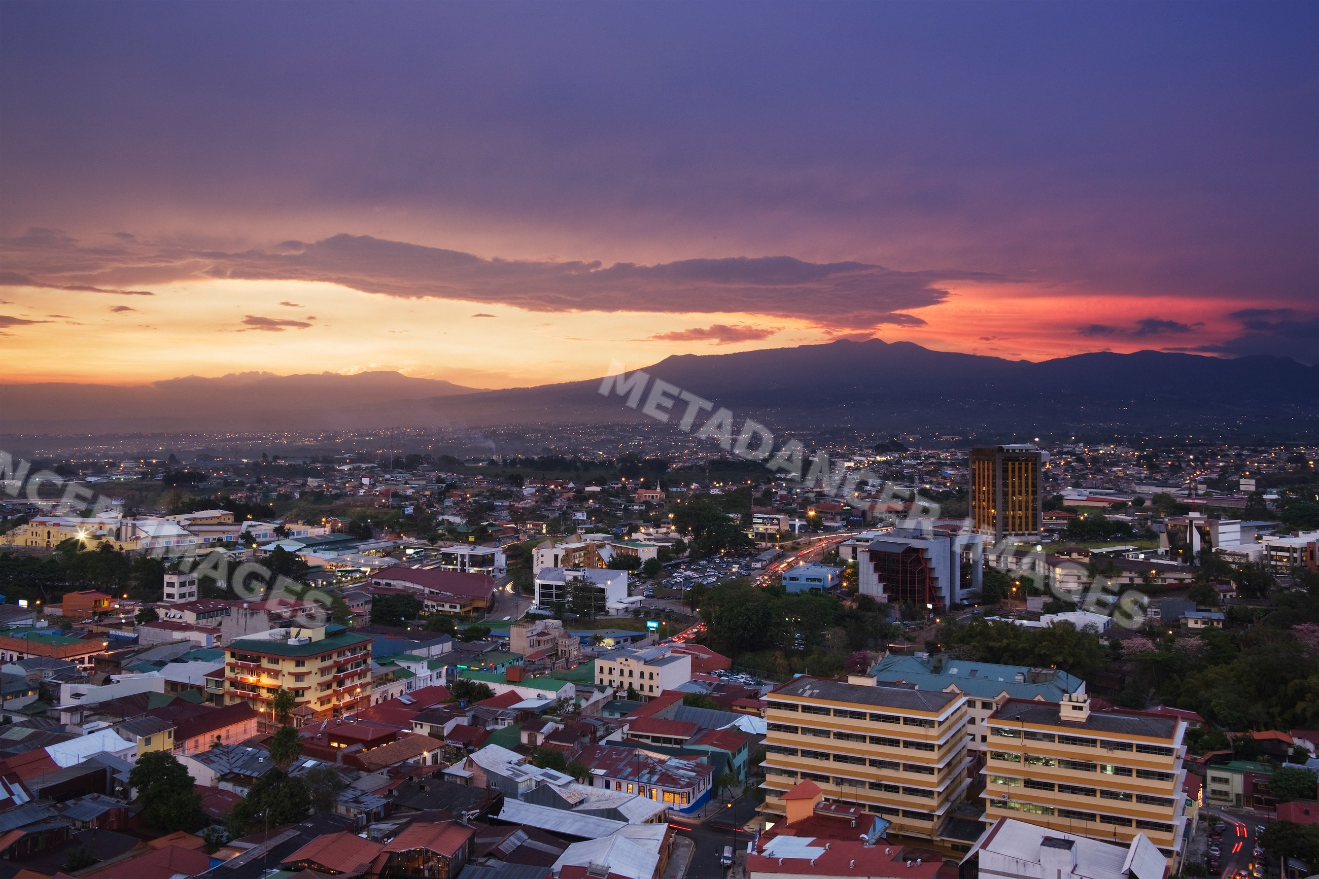 Sunset cityscape view over san jose, costa rica with mountains
