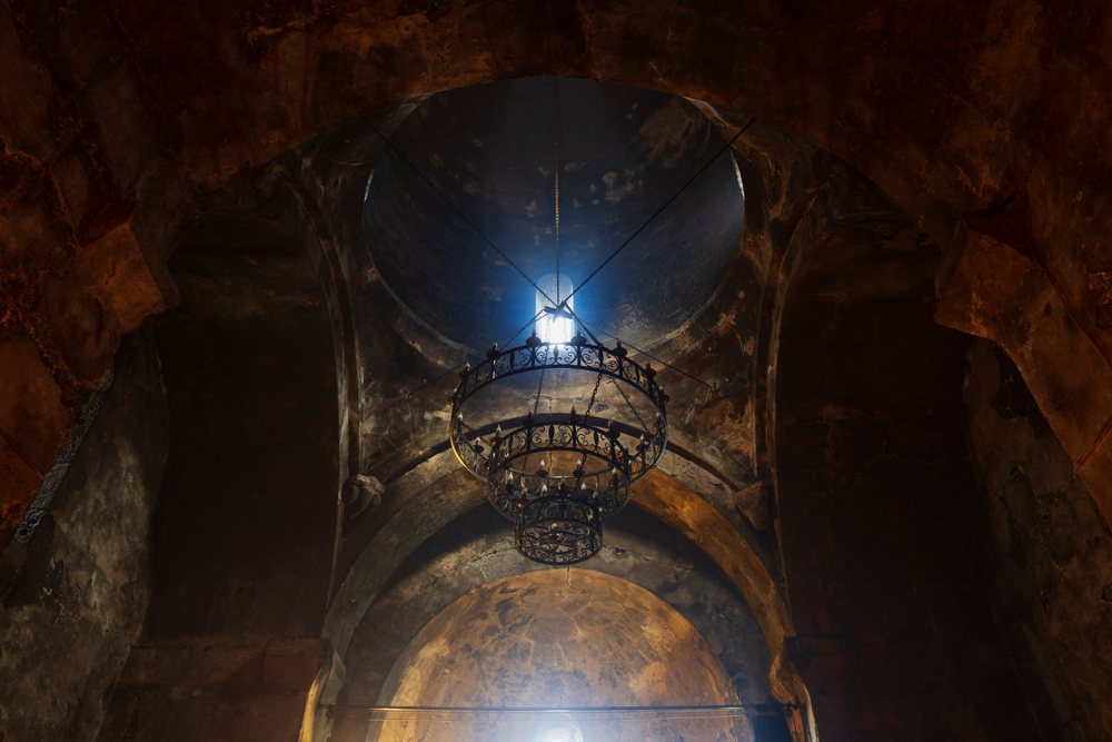 Chandelier and ceiling dome inside sanahin monastery complex