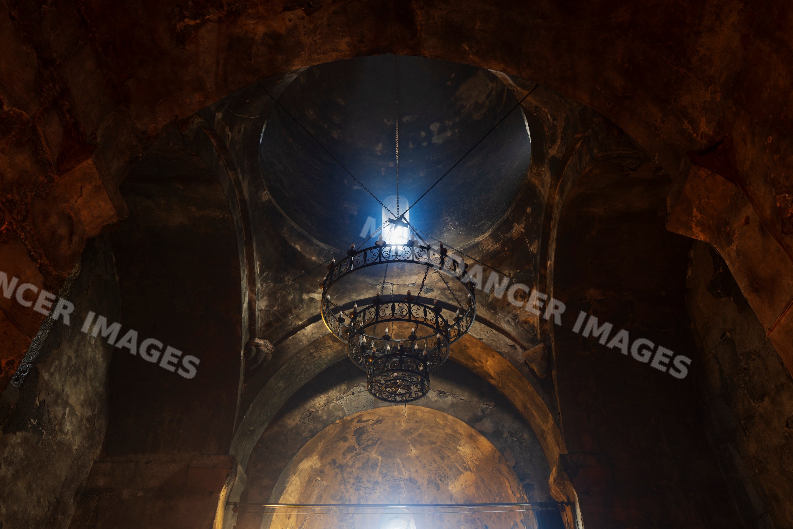 Chandelier and ceiling dome inside sanahin monastery complex