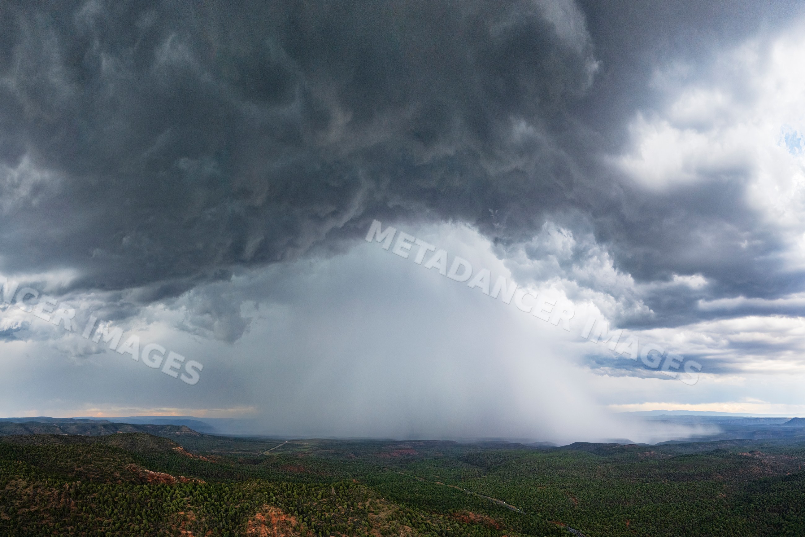 Rain shaft Downburst beneath arizona monsoon thunderstorm