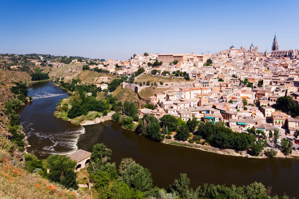 Toledo skyline with river and historic buildings