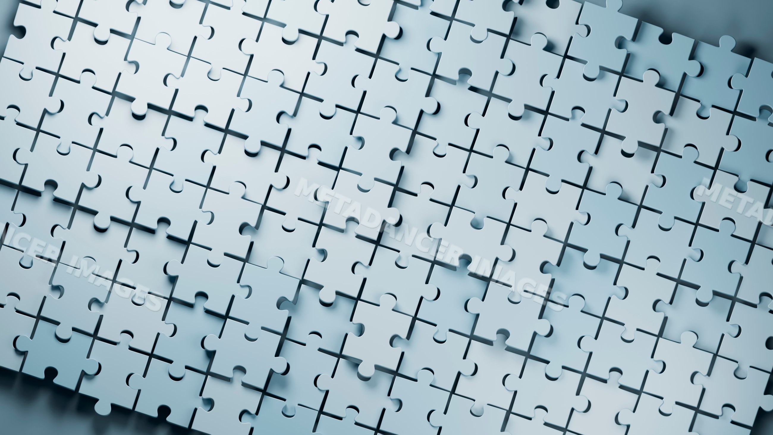 Blue interlocking jigsaw puzzle pieces in abstract pattern