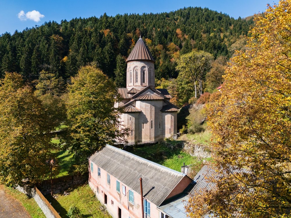 Tsagveri Timothesubvani Monastery surrounded by autumn trees