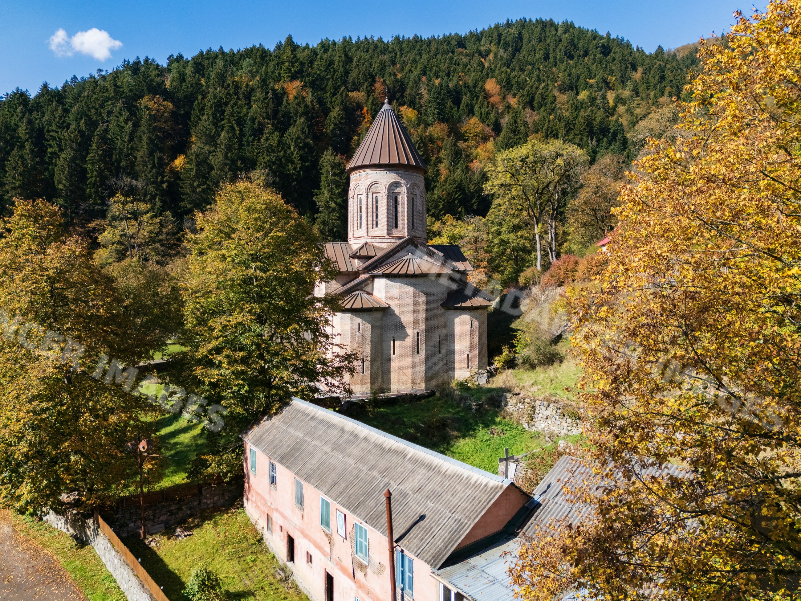 Tsagveri Timothesubvani Monastery surrounded by autumn trees