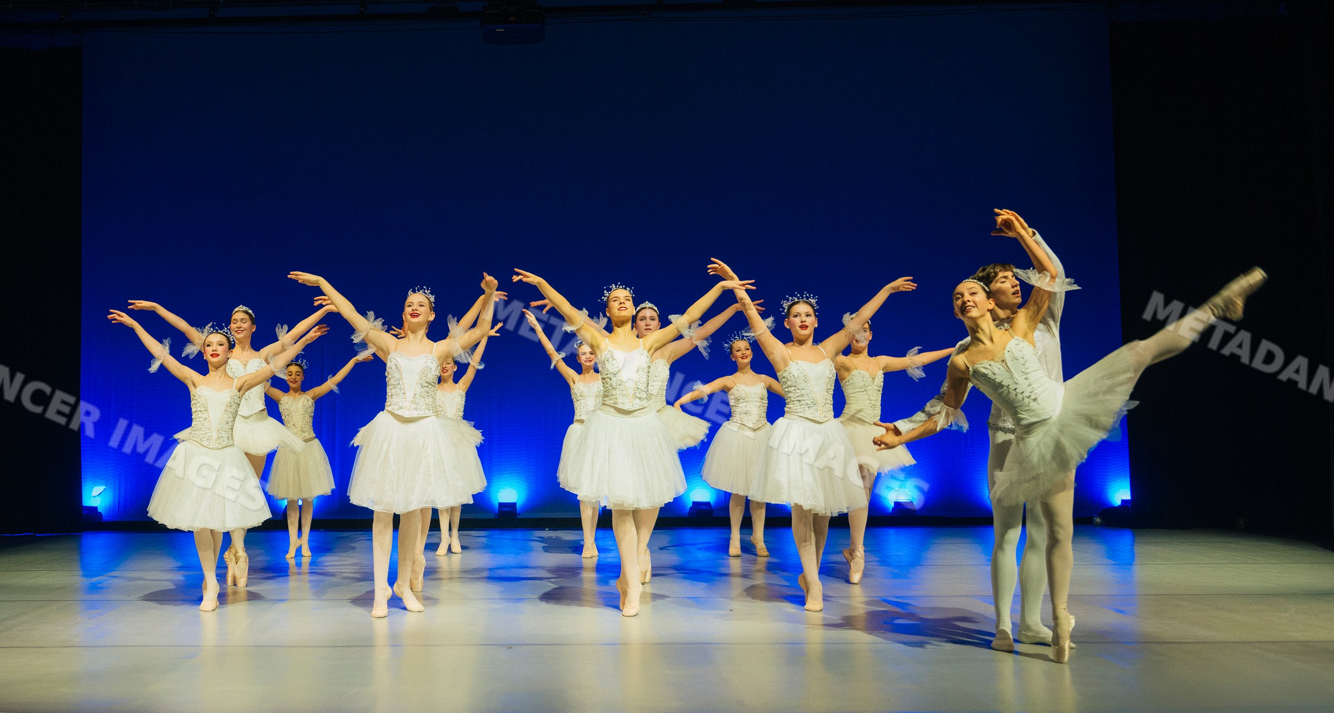 Ballet dancers perform a scene from a classical holiday ballet
