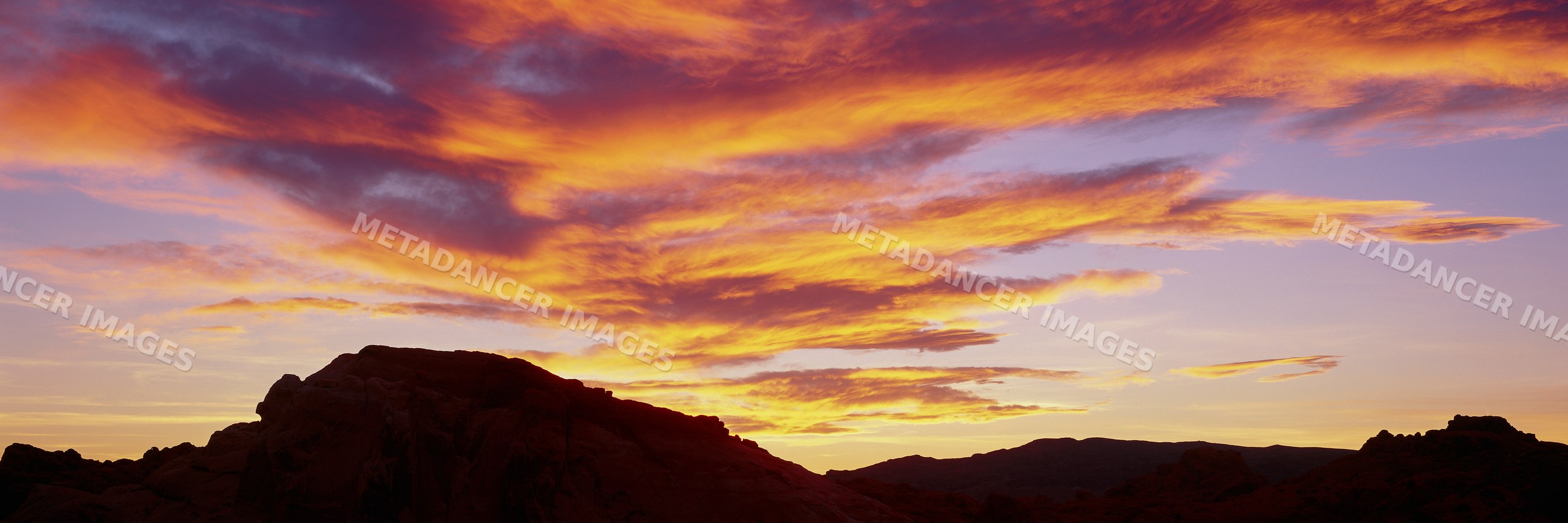 Sunset over rock formations nevada
