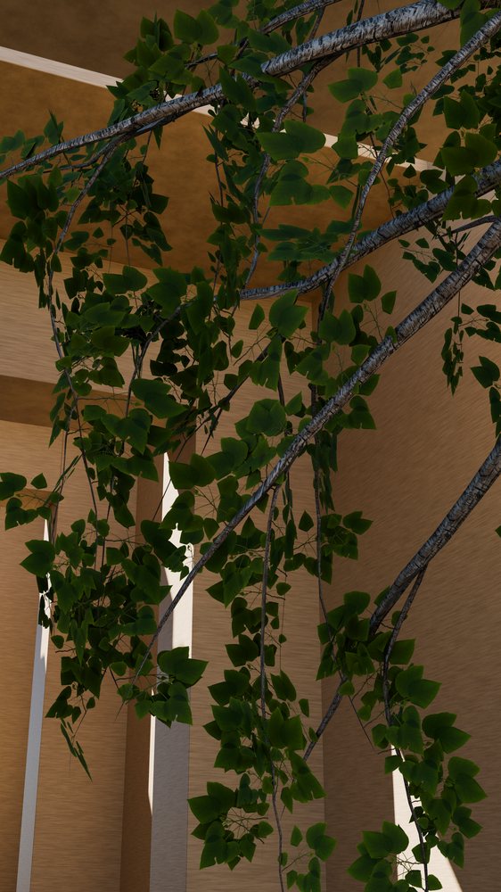 Tree branches with green leaves in indoor wooden interior