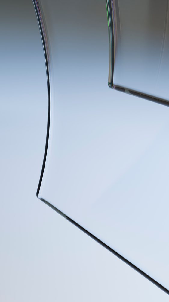 Close-up view of smooth curved glass edges with transparent
