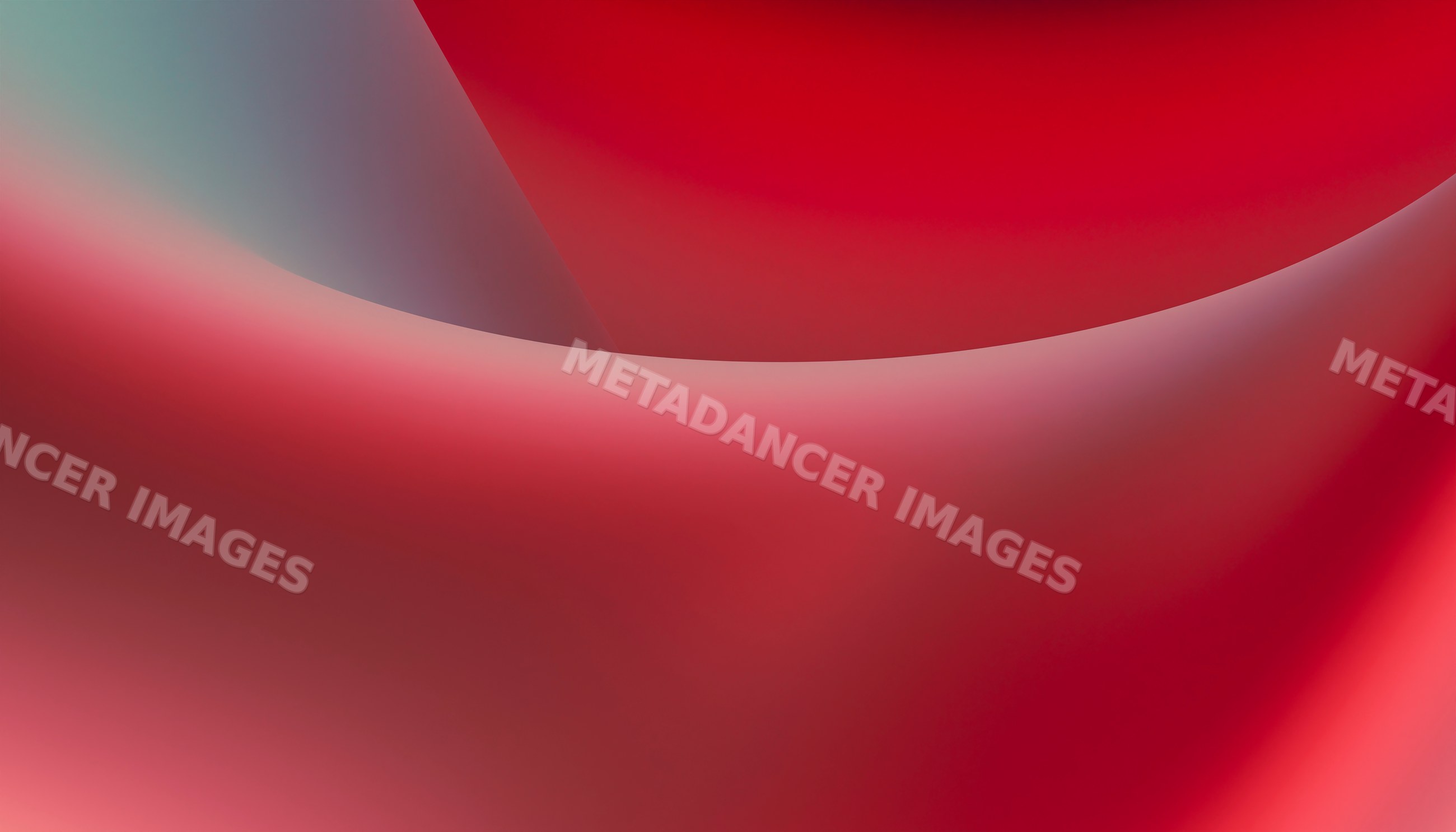 Close-up of red silky fabric with smooth curved folds in a studio