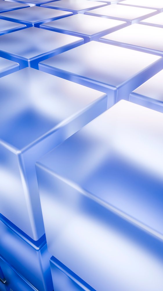 Blue translucent 3d cubes arranged in a geometric pattern